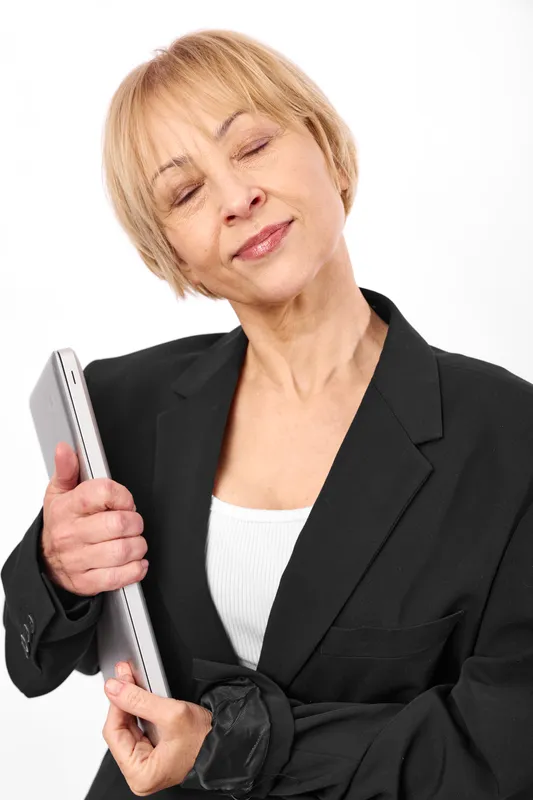 Woman senior smartphone portrait business concerned communication technology, mature businesswoman holds smartphone with doubtful expression, blazer on, isolated on background