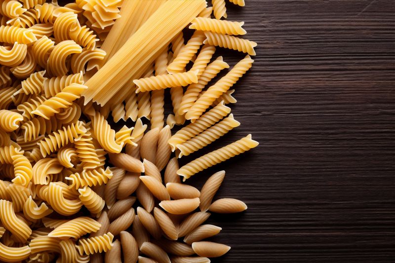 background uncooked raw pasta macaroni herb food spaghetti ingredient healthy italian. Generative AI.