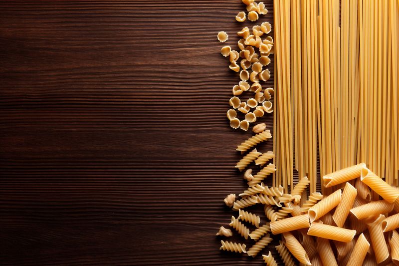 raw background spaghetti ingredient pasta uncooked macaroni food italian healthy vegetarian. Generative AI.