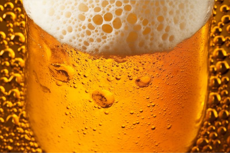 drink pub alcohol gold beer pint lager foam beverage glass. Generative AI.