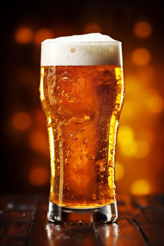 glass pint drink pub foam lager gold alcohol beverage beer. Generative AI.