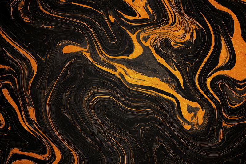 Black and gold marble texture with fluid metallic swirls and shimmering veins, an abstract liquid pattern that creates elegant contrast and luxurious organic movement across the surface.